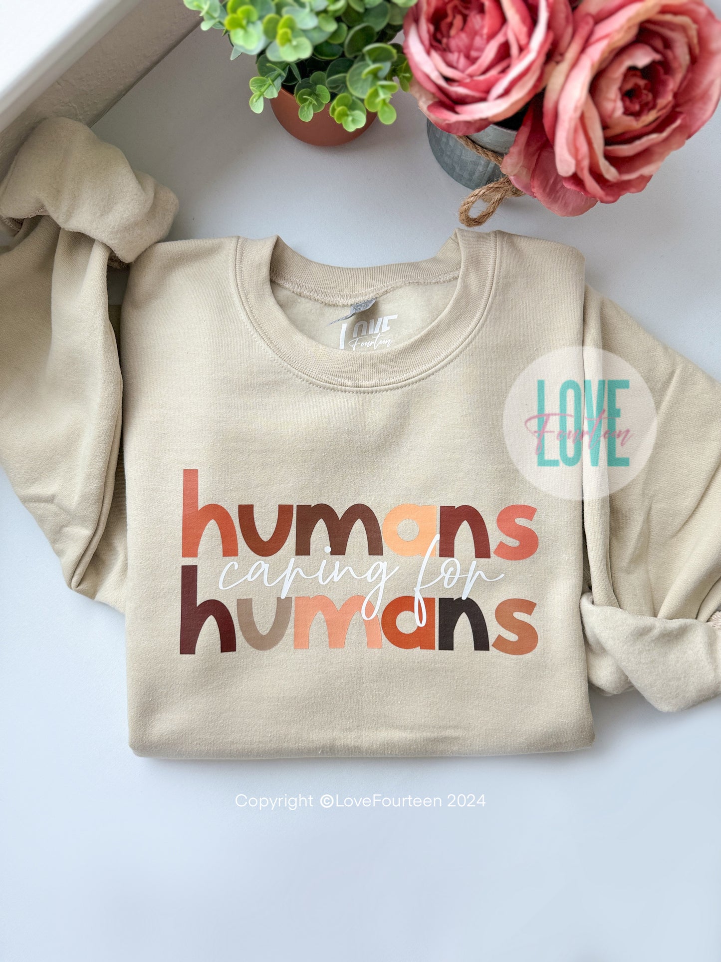 Humans Caring for Humans Crewneck