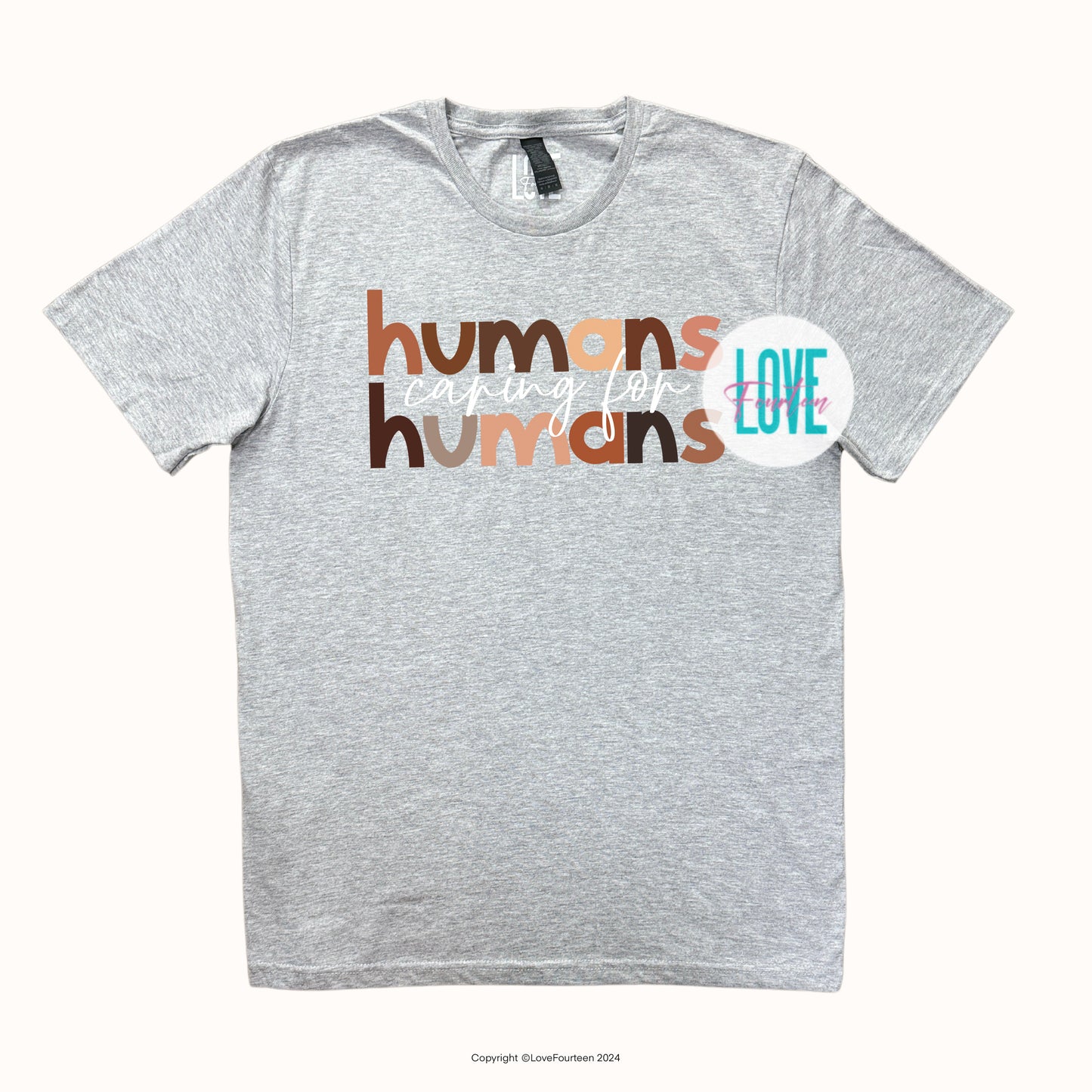 Humans caring for humans Tee