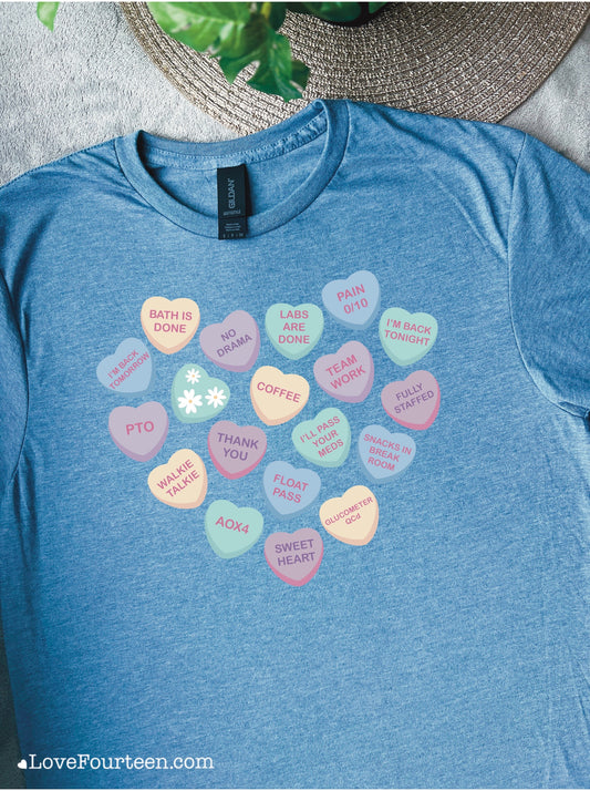 Blue t-shirt with a candy heart print for healthcare workers