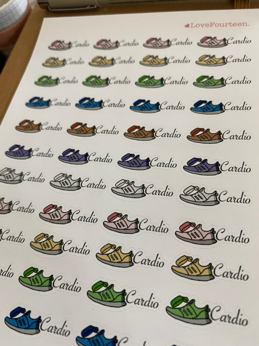 Cardio workout  journal sticker sheet on top of a planner