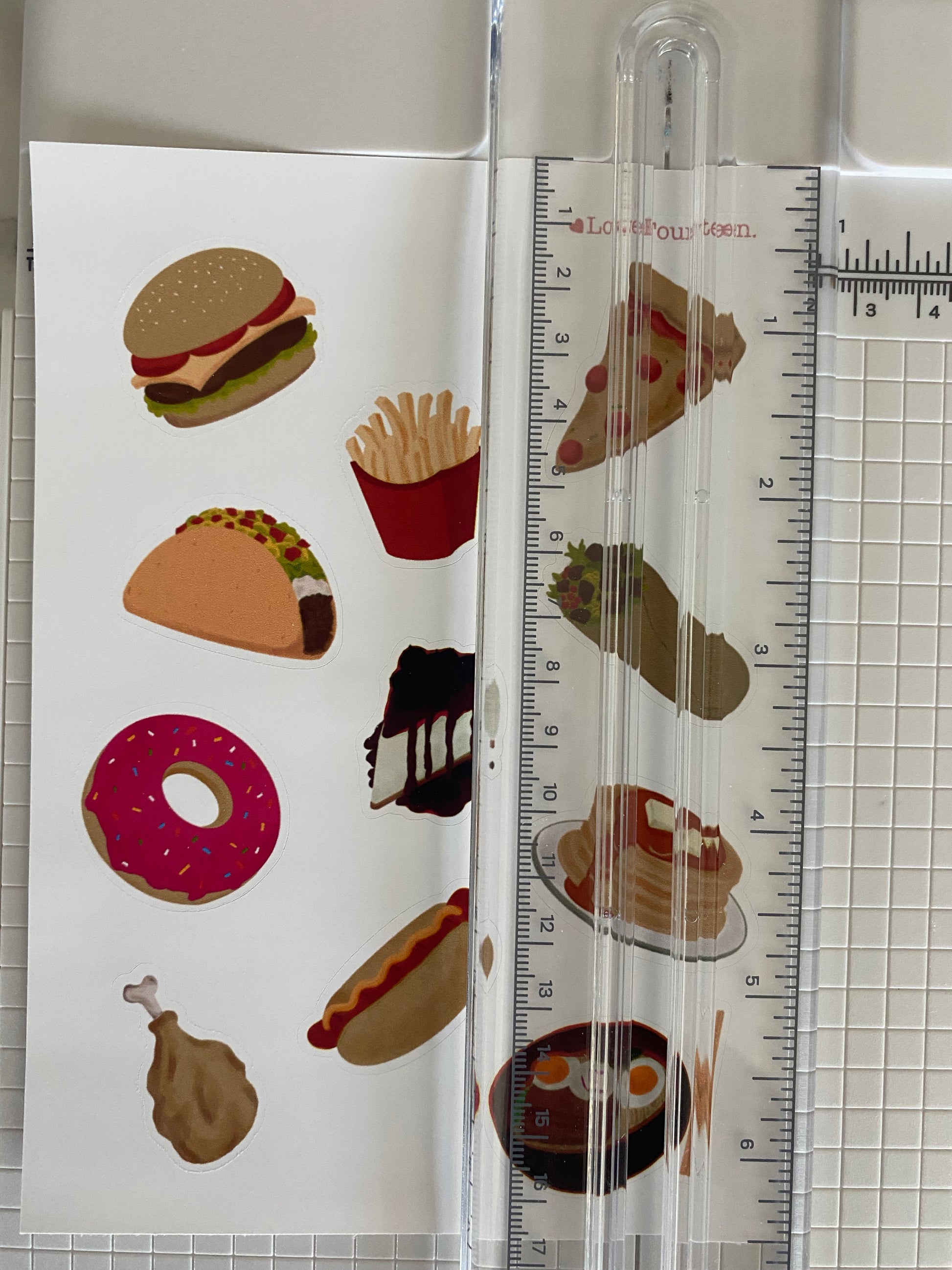 Showing the comfort journal sticker with a ruler to show the overall length of the sticker sheet